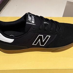 New Balance Men's Black and White Sneakers with Tan Sole